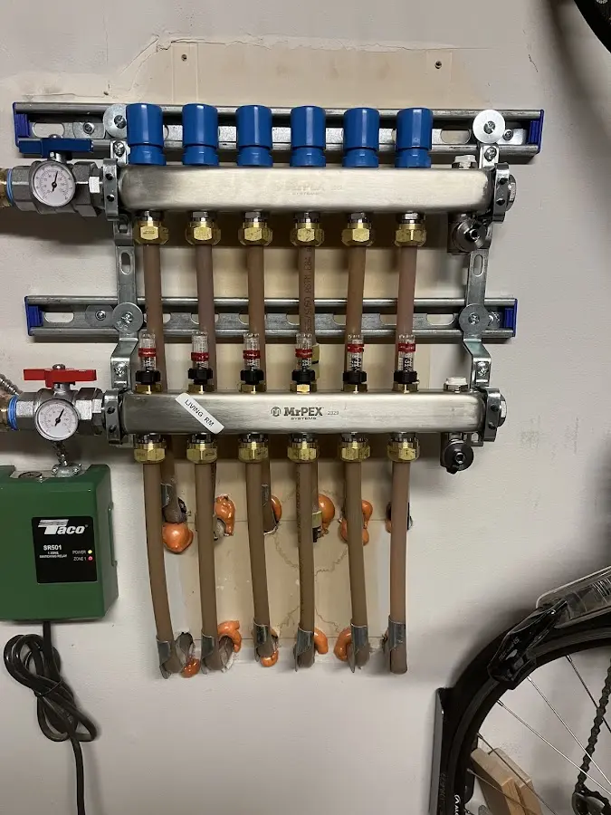 Plumber performing Water Heater Repair at a residential property in Glasgow Village